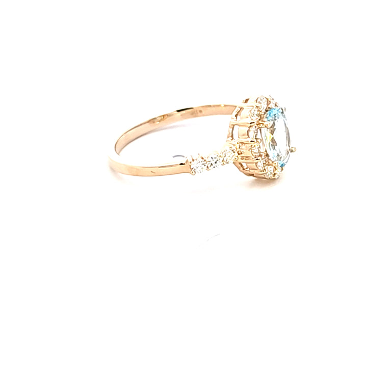 14KY Oval Aquamarine and Diamond Fashion Ring