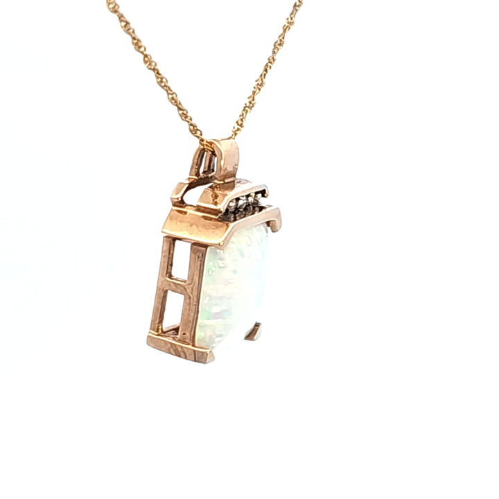 10KY Synthetic Opal and Diamond Pendant