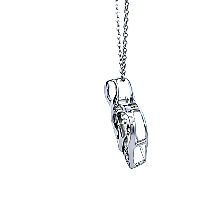 Sterling Silver Garnet and Diamond Heart Pendant