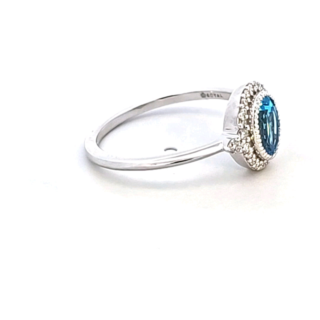 14KW Blue Topaz and Diamond Ring