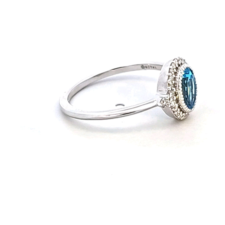 14KW Blue Topaz and Diamond Ring