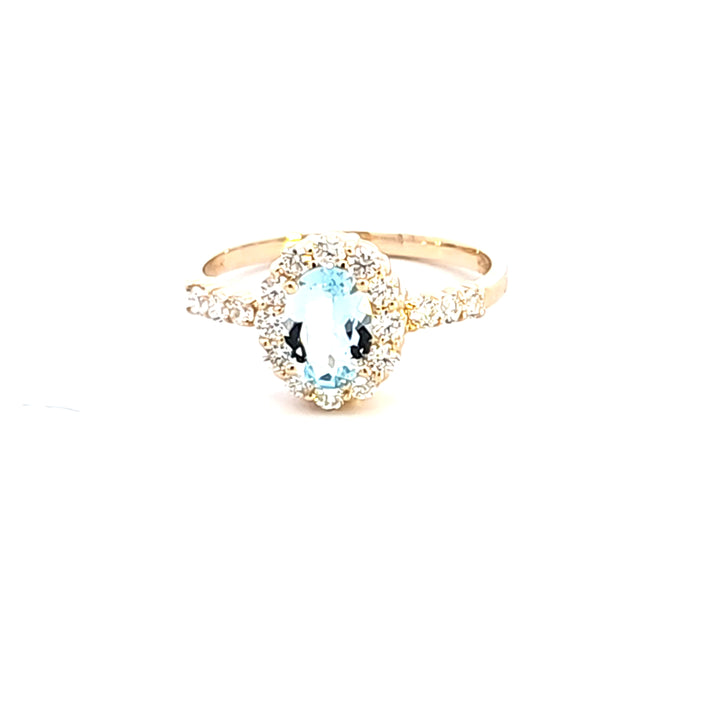 14KY Oval Aquamarine and Diamond Fashion Ring