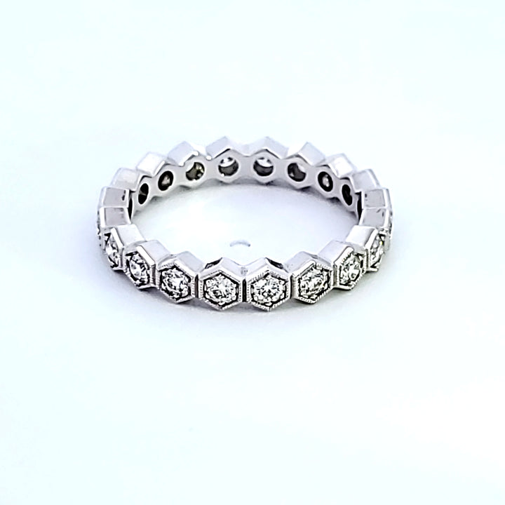 18KW Hearts on Fire "Hex Diamond Eternity" Band