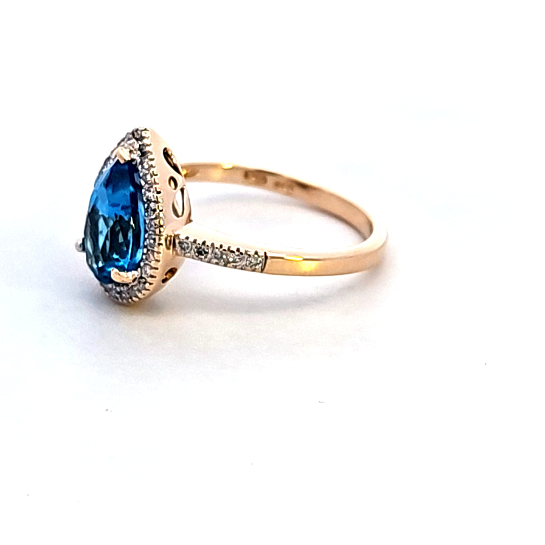 14KY Pear Blue Topaz and Diamond Ring