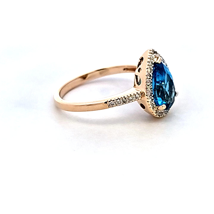 14KY Pear Blue Topaz and Diamond Ring